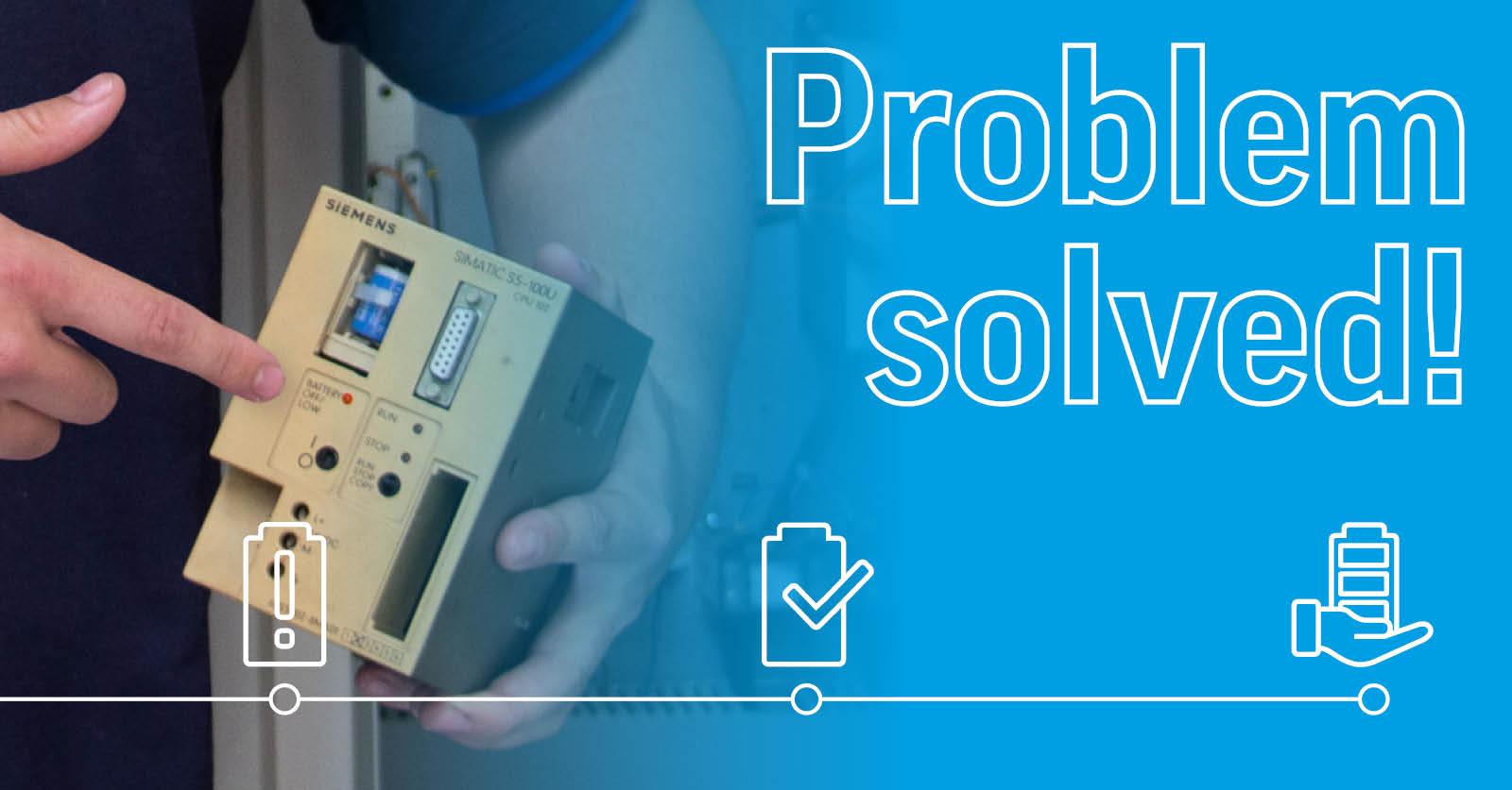 Person holding and pointing to a Siemens SIMATIC S5-100U industrial control module.